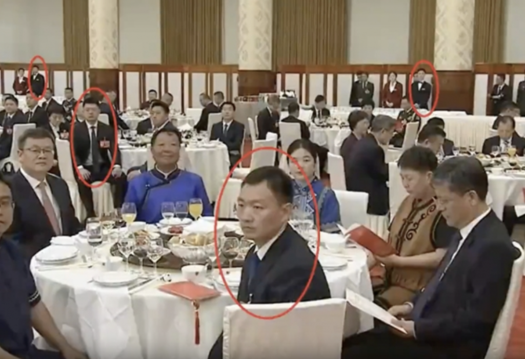 十一招待會氣氛緊張 現場密布黑衣人引疑